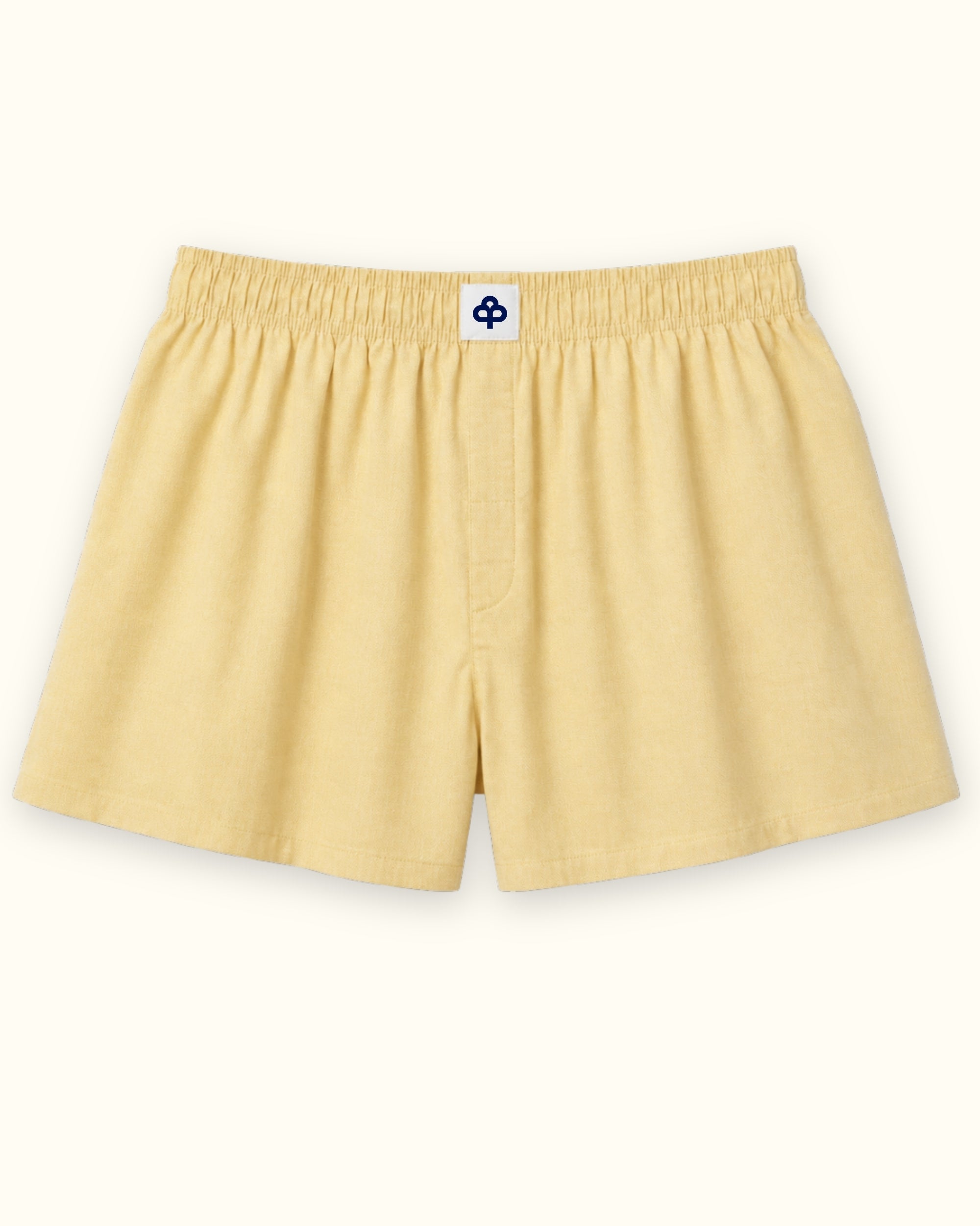 Short tipo bóxer de algodón en Oxford amarillo claro, vista frontal, mostrando la cintura y la forma de la pernera