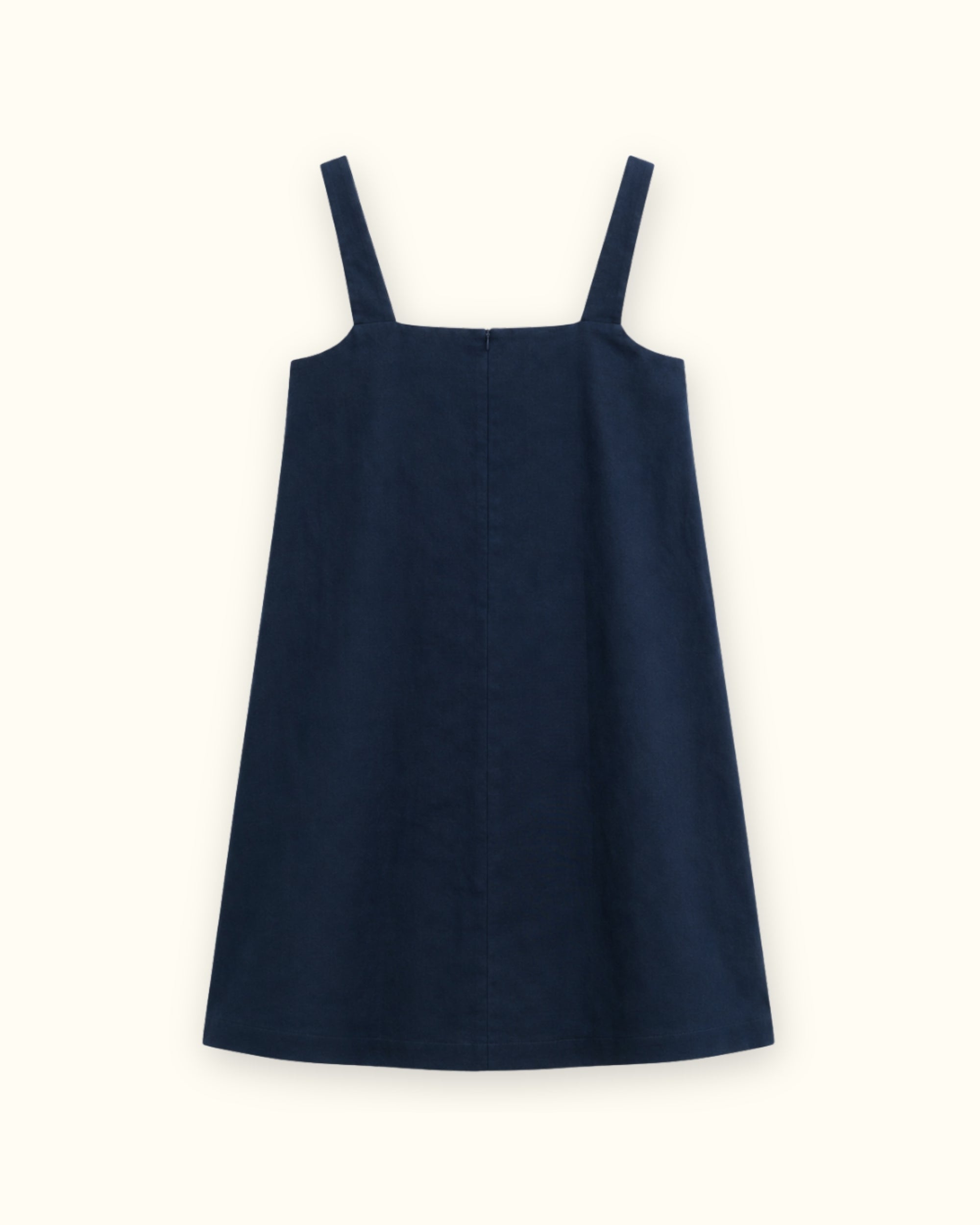 Vestido mini de lino en azul marino, vista trasera, mostrando el escote y la silueta del vestido