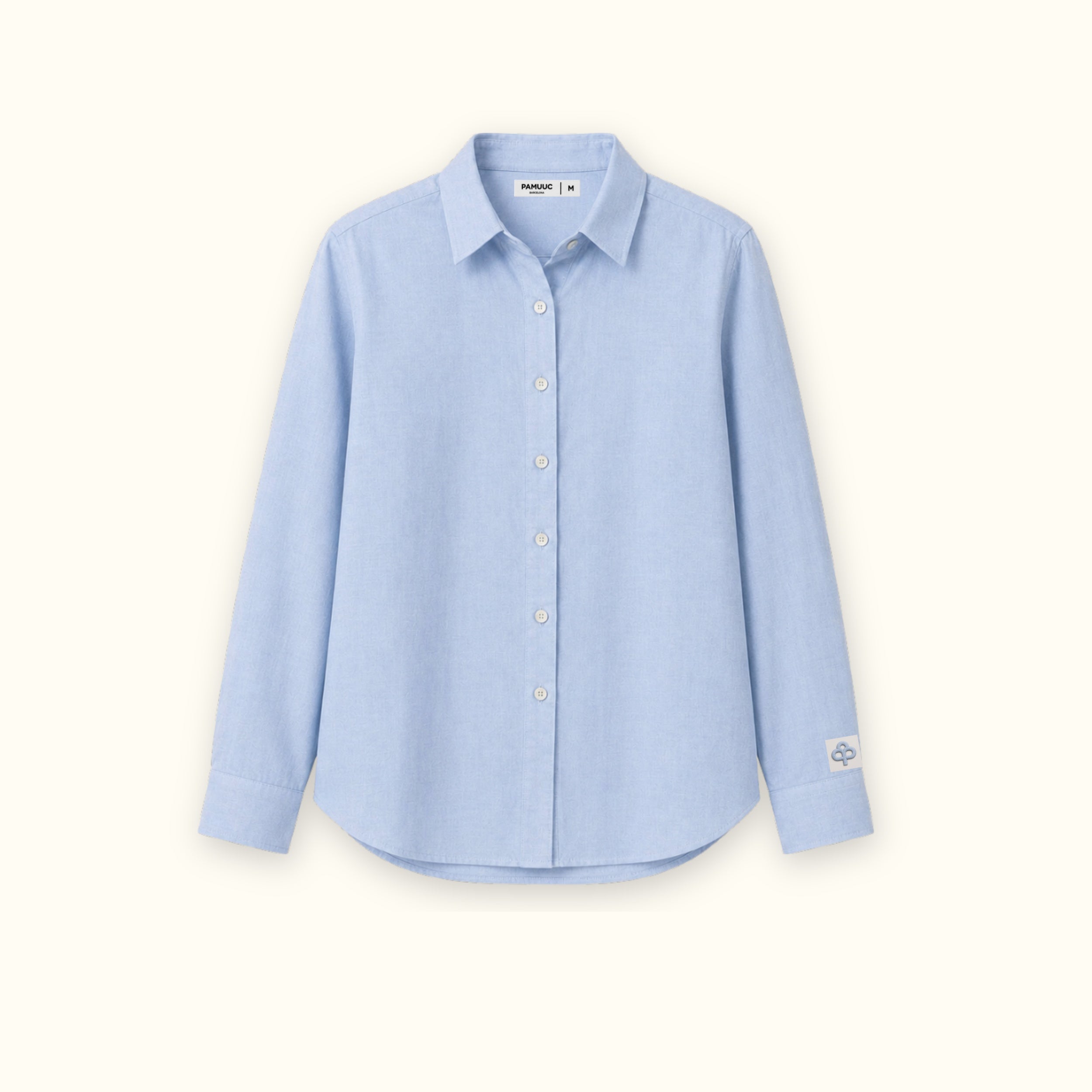 Chemise en lin coupe regular bleu clair, vue de face, montrant le col, l’ourlet et la coupe décontractée