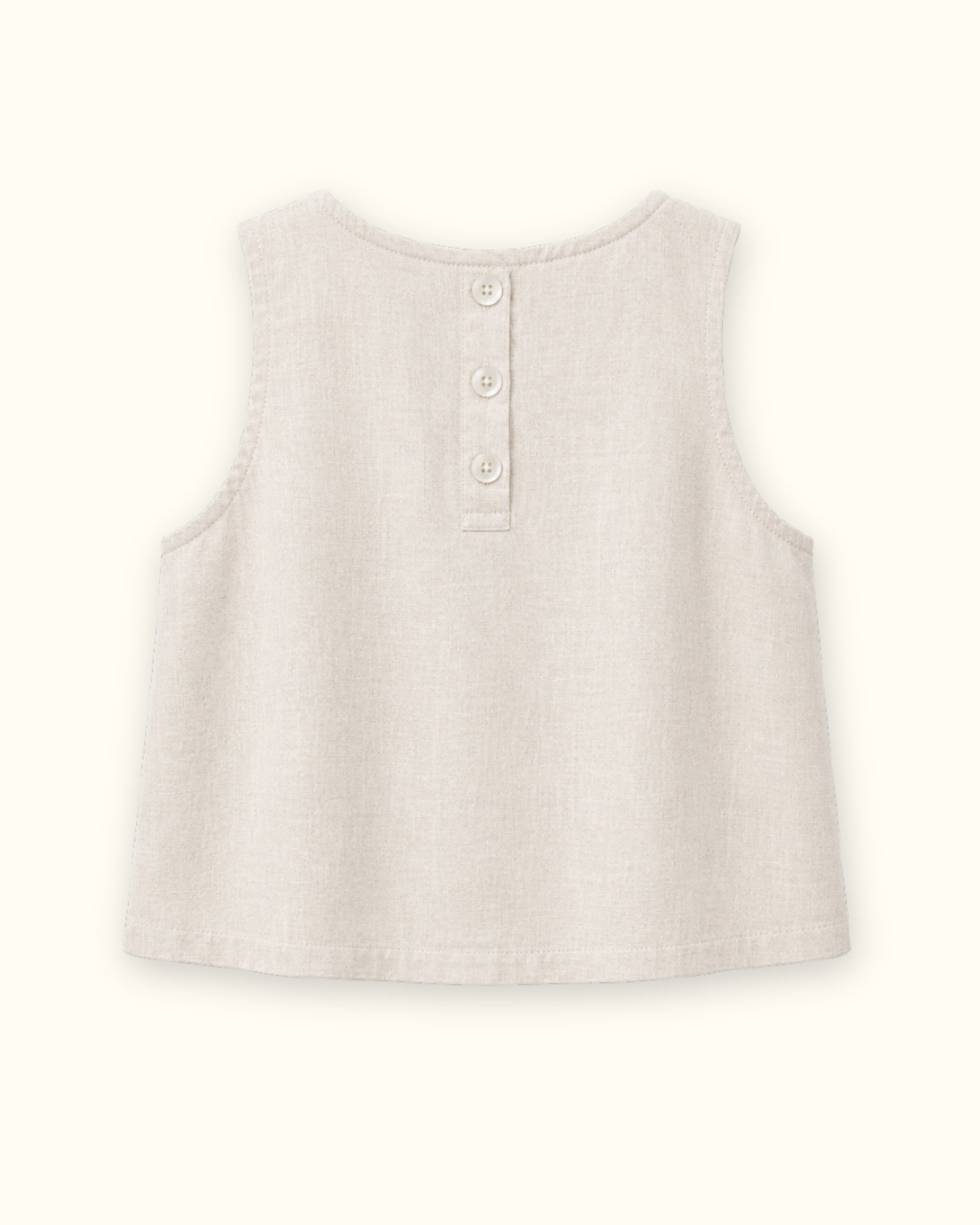 Top en lin sans manches off white, vue de dos, montrant l’encolure et la coupe sans manches
