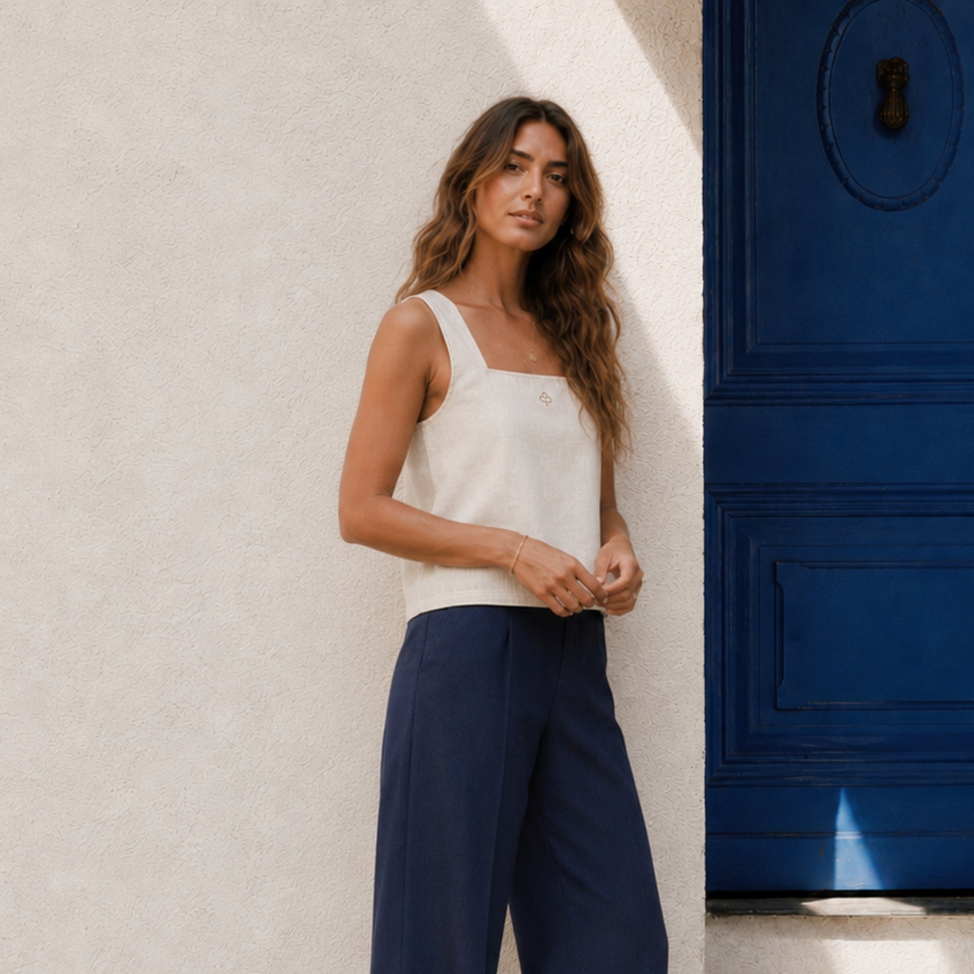 Square Neck Linen Top in Off White, lifestyle view 2, showing neckline and sleeveless shape