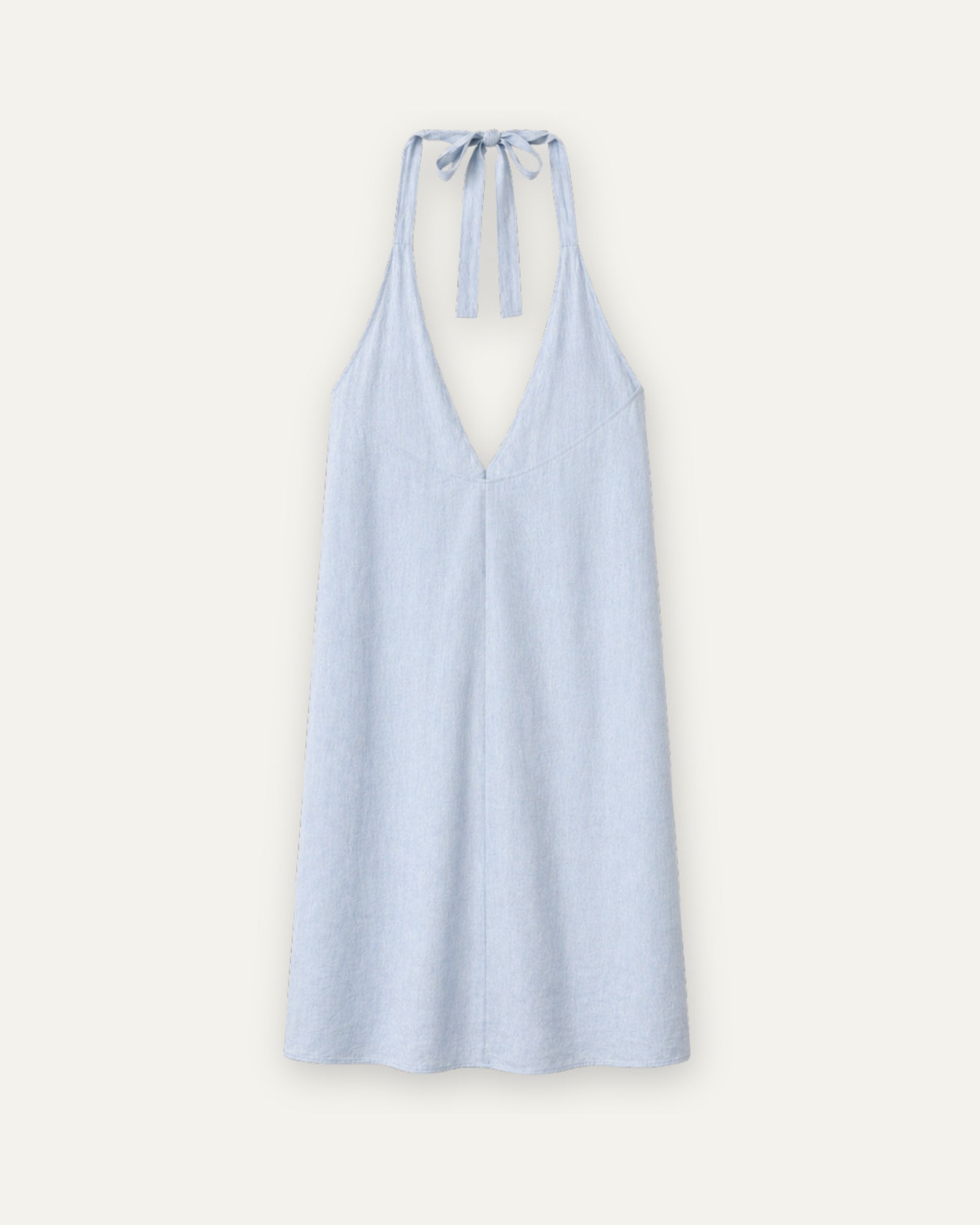 Vestido halter de lino en azul claro, vista trasera, mostrando el escote y la silueta del vestido