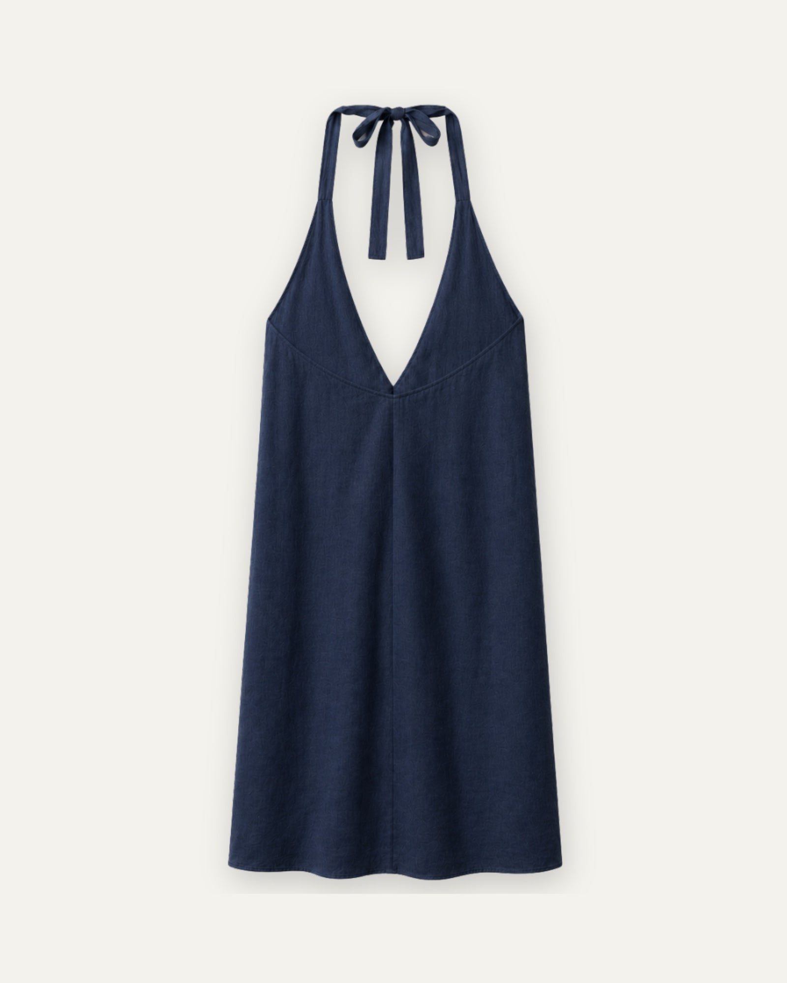 Vestido halter de lino en azul marino, vista trasera, mostrando el escote y la silueta del vestido