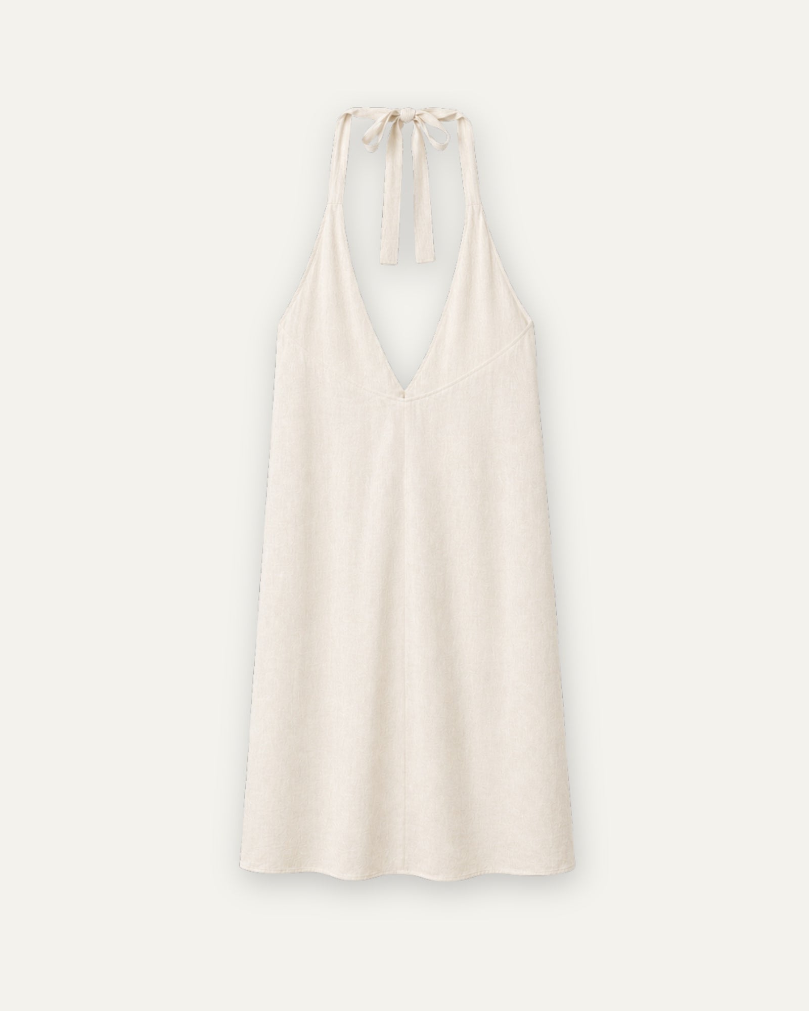 Vestido halter de lino en Off White, vista trasera, mostrando el escote y la silueta del vestido