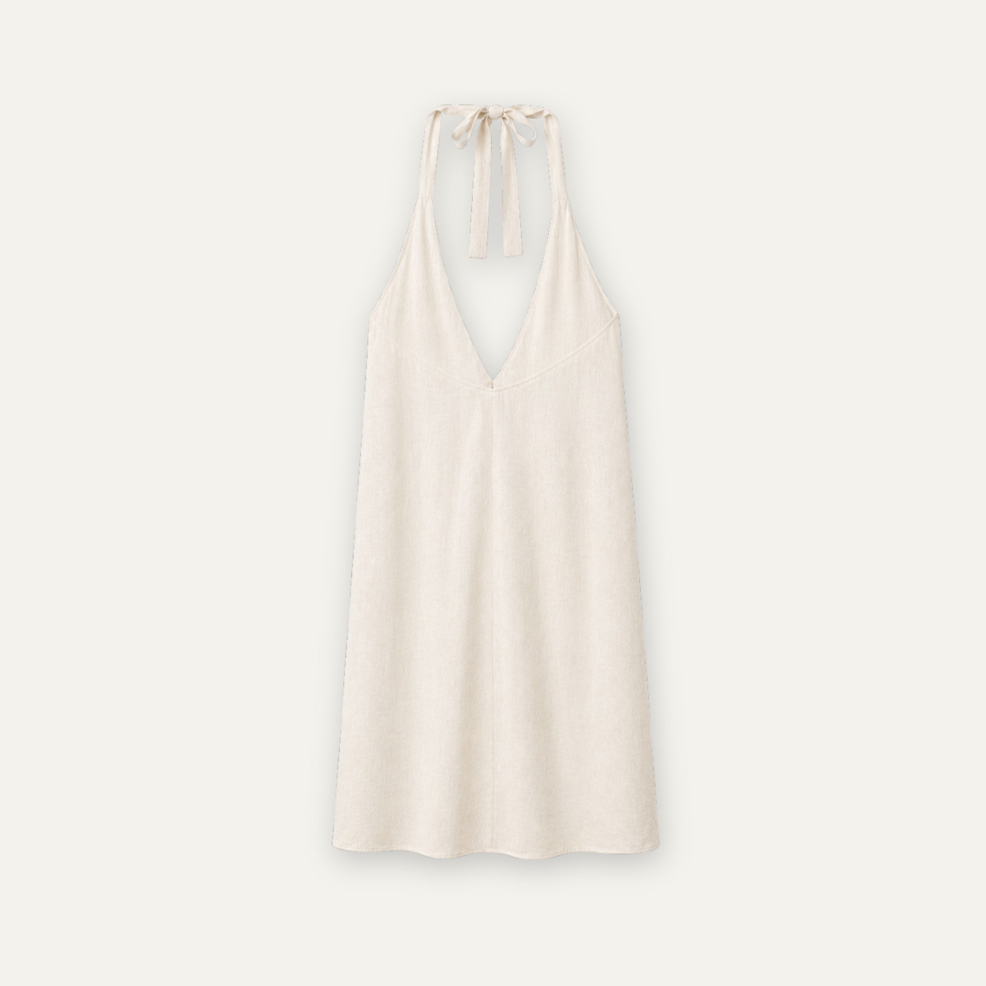 Robe halter en lin off whitee, vue de dos, montrant l’encolure et la silhouette de la robe