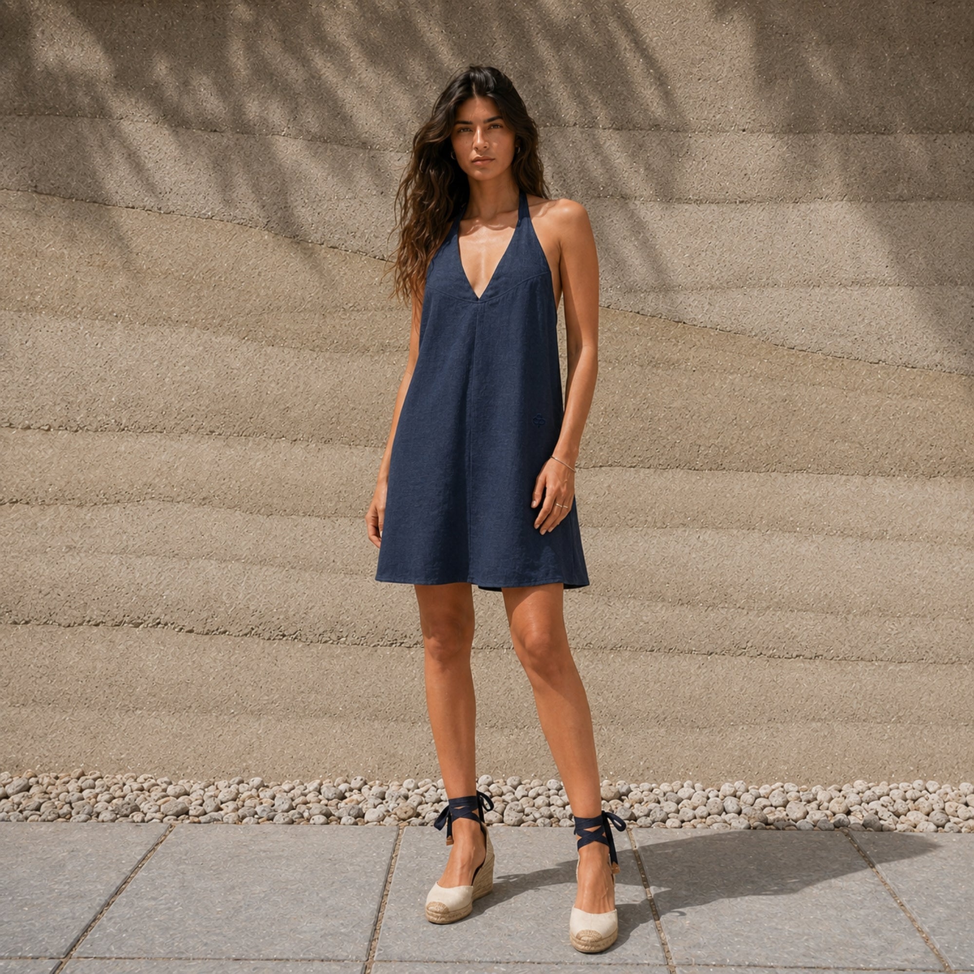 Linen Halter Dress in Navy Blue, lifestyle view 1, showing neckline and dress silhouette