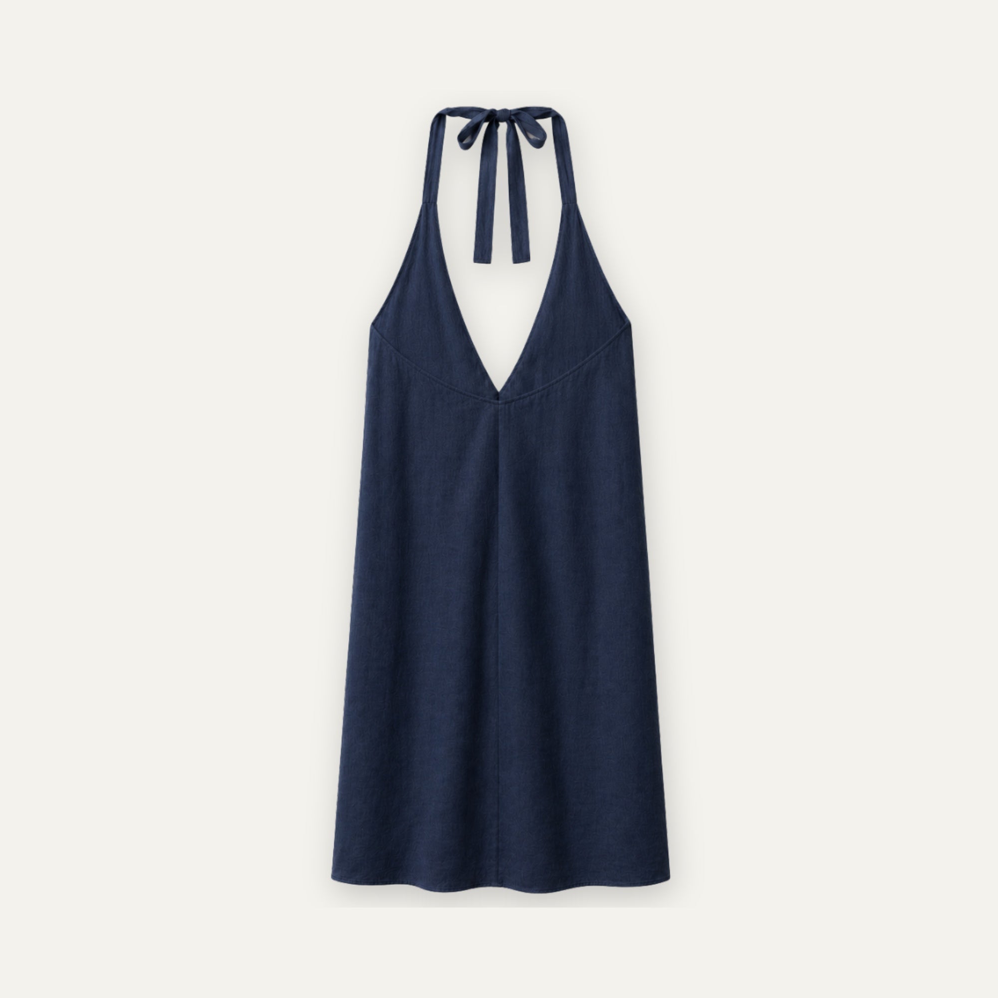 Robe halter en lin bleu marine, vue de dos, montrant l’encolure et la silhouette de la robe